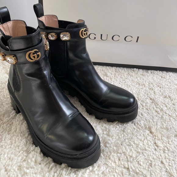 leather ankle boot with belt gucci